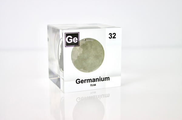 Clear acrylic cube displaying Germanium element with its name, atomic number 32, and periodic table properties. Perfect for educational purposes and collectors.