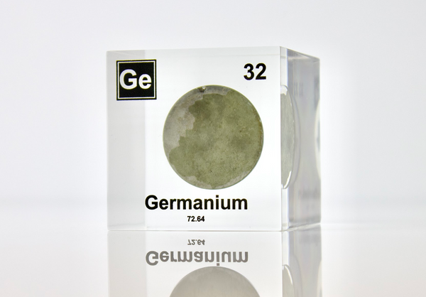 Clear acrylic cube displaying Germanium element with its name, atomic number 32, and periodic table properties. Perfect for educational purposes and collectors.