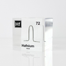 Clear acrylic cube displaying a Hafnium element (Atomic Number 72) embedded within, offering a scientific presentation for collectors and science enthusiasts.