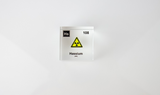 Clear acrylic cube displaying a Hassium element (Atomic Number 108) embedded within, offering a scientific presentation for collectors and science enthusiasts.