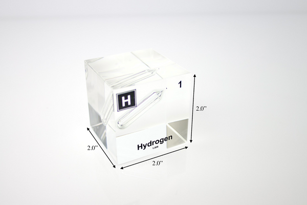 Clear acrylic cube displaying a Hydrogen element (Atomic Number 1) embedded within, offering a scientific presentation for collectors and science enthusiasts.