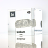 Clear acrylic cube displaying an Indium element (Atomic Number 49) embedded within, offering a scientific presentation for collectors and science enthusiasts.