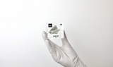 Clear acrylic cube displaying an Indium element (Atomic Number 49) embedded within, offering a scientific presentation for collectors and science enthusiasts.