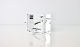 Clear acrylic cube displaying a Lanthanum element (Atomic Number 57) embedded within, offering a scientific presentation for collectors and science enthusiasts.