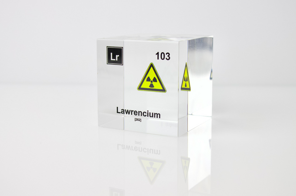 Clear acrylic cube displaying a Lawrencium element (Atomic Number 103) embedded within, offering a scientific presentation for collectors and science enthusiasts.