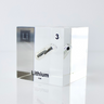 Clear acrylic cube displaying a Lithium element (Atomic Number 3) embedded within, offering a scientific presentation for collectors and science enthusiasts.