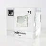 Clear acrylic cube displaying a Lutetium element (Atomic Number 71) embedded within, offering a scientific presentation for collectors and science enthusiasts.