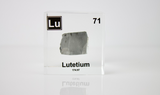 Clear acrylic cube displaying a Lutetium element (Atomic Number 71) embedded within, offering a scientific presentation for collectors and science enthusiasts.