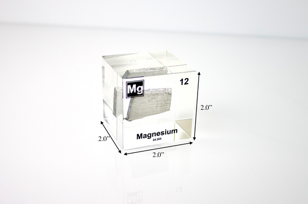 Clear acrylic cube featuring a Magnesium ampule with its atomic number 12. Ideal for educational displays, scientific collections, or as a distinctive decorative item.