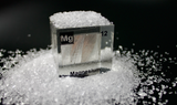 Clear acrylic cube featuring a Magnesium ampule with its atomic number 12. Epsom salts surrounding as Magnesium element is used for them. Ideal for educational displays, scientific collections, or as a distinctive decorative item.