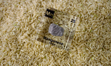 Manganese element in a clear acrylic cube, showcasing its name, atomic number, and properties as displayed on the periodic table. A stylish and informative piece for collectors and educators.