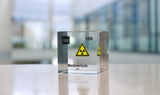 Clear acrylic cube displaying a Meitnerium element (Atomic Number 109) embedded within, offering a scientific presentation for collectors and science enthusiasts.