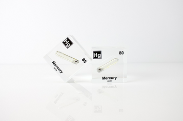 Clear acrylic cube displaying a Mercury element (Atomic Number 80) embedded within, offering a scientific presentation for collectors and science enthusiasts.