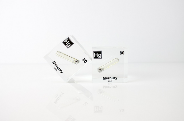 Clear acrylic cube displaying a Mercury element (Atomic Number 80) embedded within, offering a scientific presentation for collectors and science enthusiasts.