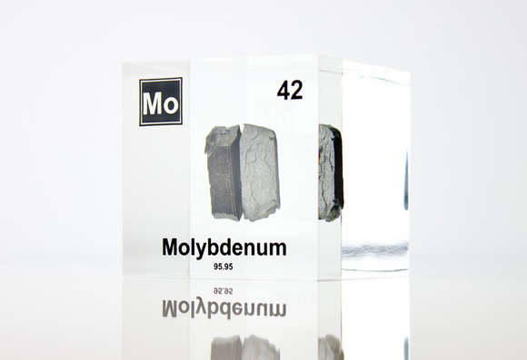 Clear acrylic cube displaying a Molybdenum element (Atomic Number 42) embedded within, offering a scientific presentation for collectors and science enthusiasts.