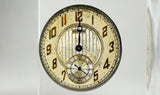 Clear acrylic display case showcasing a detailed watch face with hands and markers, offering a stylish presentation for watch enthusiasts and collectors.