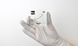 Clear acrylic cube encasing a Neon ampule with its atomic number 10. Ideal for display in educational settings, scientific collections, or as a decorative piece.