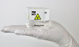Clear acrylic cube displaying a Neptunium element (Atomic Number 93) embedded within, offering a scientific presentation for collectors and science enthusiasts.