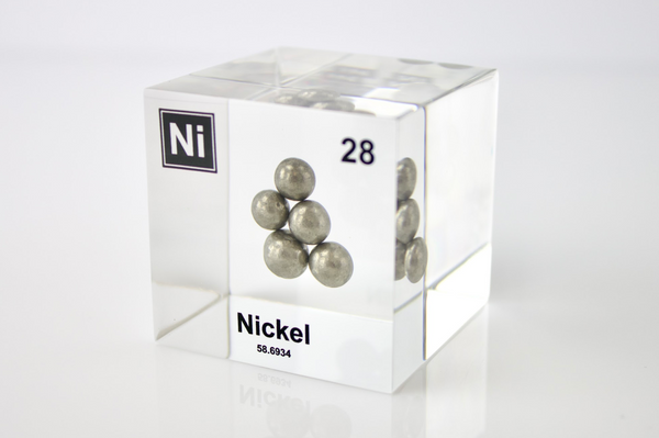 Nickel element, atomic number 28, in a clear acrylic cube, displaying its name, atomic number, and key properties as shown on the periodic table. An educational and informative piece ideal for science enthusiasts and collectors.