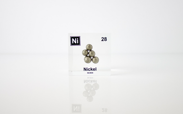 Nickel element, atomic number 28, in a clear acrylic cube, displaying its name, atomic number, and key properties as shown on the periodic table. An educational and informative piece ideal for science enthusiasts and collectors.