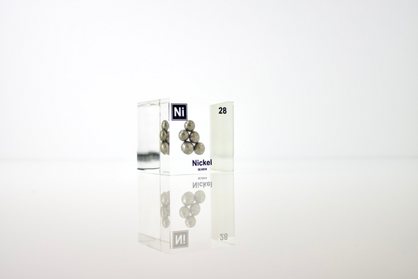 Nickel element, atomic number 28, in a clear acrylic cube, displaying its name, atomic number, and key properties as shown on the periodic table. An educational and informative piece ideal for science enthusiasts and collectors.