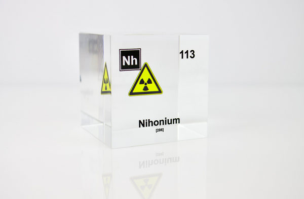 Clear acrylic cube displaying a Nihonium element (Atomic Number 113) embedded within, offering a scientific presentation for collectors and science enthusiasts.