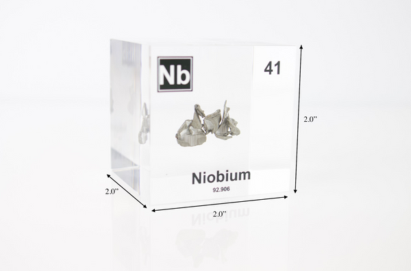 Clear acrylic cube displaying a Niobium element (Atomic Number 41) embedded within, offering a scientific presentation for collectors and science enthusiasts.