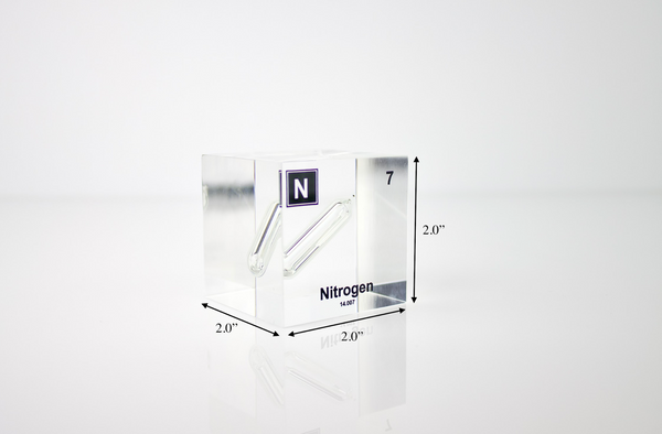 Clear acrylic cube encasing a Nitrogen ampule with its atomic number 7. Ideal for display in educational settings, scientific collections, or as a decorative piece.