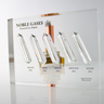 Close-up of a noble gas display made of acrylic. The display features several sections, each containing a different noble gas in its inert, gaseous form, with clear labels identifying each gas. 