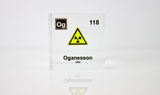 Clear acrylic cube displaying an Oganesson element (Atomic Number 118) embedded within, offering a scientific presentation for collectors and science enthusiasts.