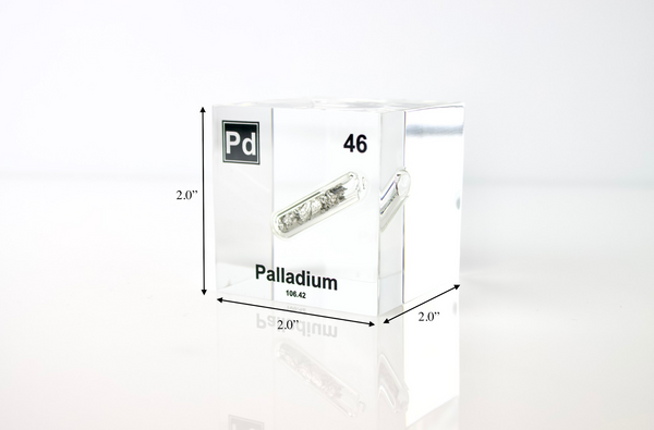 Clear acrylic cube displaying a Palladium element (Atomic Number 46) embedded within, offering a scientific presentation for collectors and science enthusiasts.