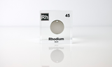 Clear acrylic cube displaying a Rhodium element (Atomic Number 45) embedded within, offering a scientific presentation for collectors and science enthusiasts.