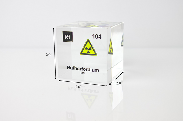 Clear acrylic cube displaying a Rutherfordium element (Atomic Number 104) embedded within, offering a scientific presentation for collectors and science enthusiasts.