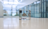 Manganese element in a clear acrylic cube, showcasing its name, atomic number, and properties as displayed on the periodic table. A stylish and informative piece for collectors and educators.