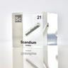 Clear acrylic cube displaying a Scandium element (Atomic Number 21) embedded within, offering a scientific presentation for collectors and science enthusiasts.