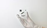 Clear acrylic cube displaying a Scandium element (Atomic Number 21) embedded within, offering a scientific presentation for collectors and science enthusiasts.