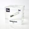 Clear acrylic cube encasing a Selenium ampule with its atomic number 34. Ideal for display in educational settings, scientific collections, or as a decorative piece.
