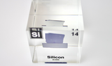 Clear acrylic cube showcasing a Silicon ampule with its atomic number 14. Ideal for use in classrooms, scientific collections, or as a distinctive display piece.
