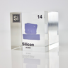 Clear acrylic cube showcasing a Silicon ampule with its atomic number 14. Ideal for use in classrooms, scientific collections, or as a distinctive display piece.