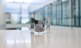 Clear acrylic cube showcasing a Silicon ampule with its atomic number 14. Ideal for use in classrooms, scientific collections, or as a distinctive display piece.