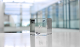 Clear acrylic cube displaying a Silver element (Atomic Number 47) embedded within, offering a scientific presentation for collectors and science enthusiasts.