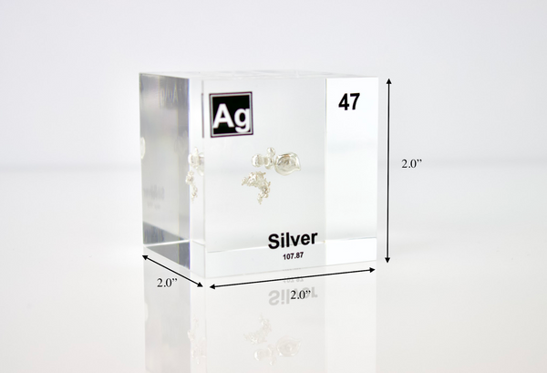 Clear acrylic cube displaying a Silver element (Atomic Number 47) embedded within, offering a scientific presentation for collectors and science enthusiasts.