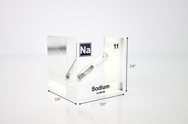 Clear acrylic cube containing a Sodium ampule, marked with its atomic number 11. Perfect for showcasing in educational environments, scientific collections, or as a unique decorative element.