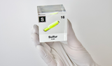 Clear acrylic cube displaying a Sulfur element (Atomic Number 16) embedded within, offering a scientific presentation for collectors and science enthusiasts.