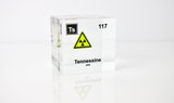 Clear acrylic cube displaying a Tennessine element (Atomic Number 117) embedded within, offering a scientific presentation for collectors and science enthusiasts.