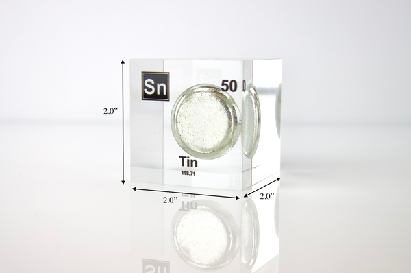 Clear acrylic cube displaying a Tin element (Atomic Number 50) embedded within, offering a scientific presentation for collectors and science enthusiasts.