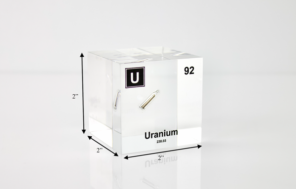 Clear acrylic cube displaying a Uranium element (Atomic Number 92) embedded within, offering a scientific presentation for collectors and science enthusiasts.