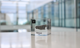 Clear acrylic cube displaying a Yttrium element (Atomic Number 39) embedded within, offering a scientific presentation for collectors and science enthusiasts.