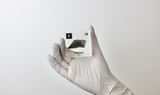 Clear acrylic cube displaying a Yttrium element (Atomic Number 39) embedded within, offering a scientific presentation for collectors and science enthusiasts.